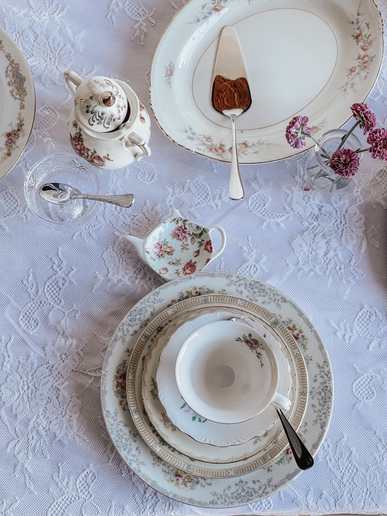 Vintage teacup and saucer on a lace tablecloth